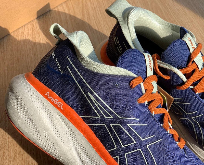 Asics Gel - Nimbus™ 25 Azul Marinho com Laranja e Branco